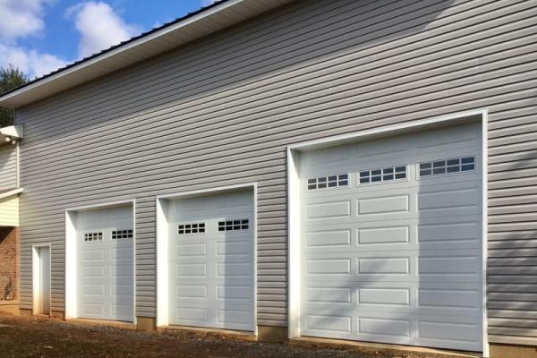 Three Long Raised Panel Doors in white with windows