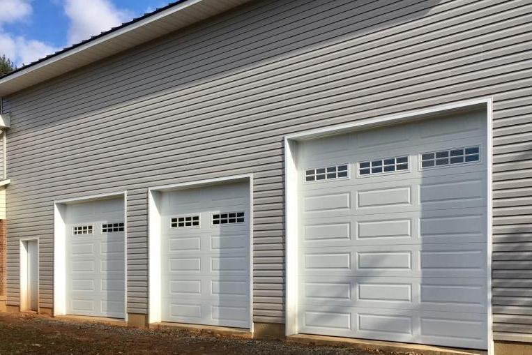 Three Long Raised Panel Doors in white with windows